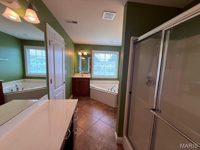 205 Prominence Ln, Lake St Louis, MO 63367 - full bath with vanity, a bath, a stall shower, and tile patterned floors
