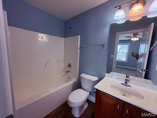 205 Prominence Ln, Lake St Louis, MO 63367 - bathroom with vanity, tub / shower combination, ceiling fan, and tile patterned flooring