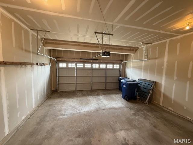 205 Prominence Ln, Lake St Louis, MO 63367 - garage featuring a garage door opener