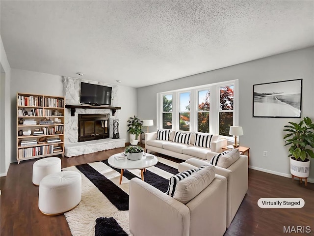 68 W Lakewood Dr, Fenton, MO 63026 - living room with a fireplace, a textured ceiling, and wood finished floors