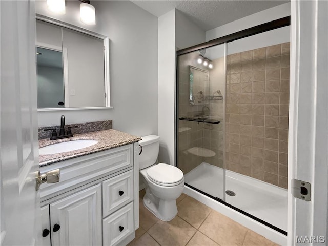 68 W Lakewood Dr, Fenton, MO 63026 - full bath featuring a shower stall, vanity, tile patterned flooring, and a textured ceiling