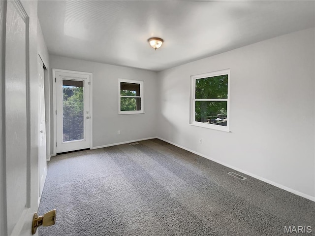 68 W Lakewood Dr, Fenton, MO 63026 - spare room with baseboards and carpet flooring