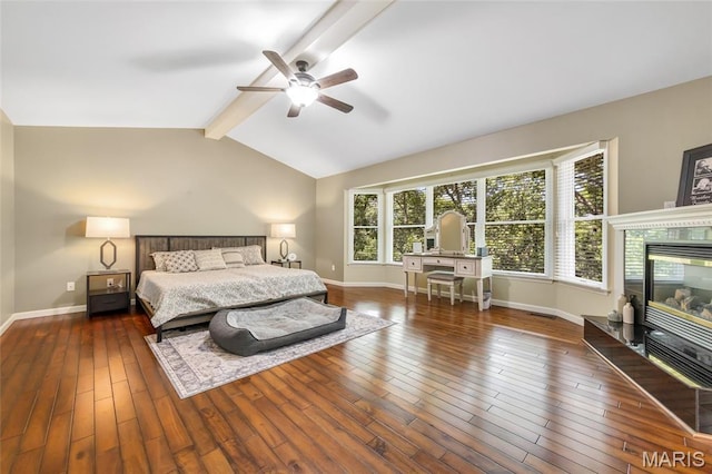 16517 Lancaster Estates Dr, Grover, MO 63040 - bedroom featuring wood-type flooring, a tiled fireplace, and a ceiling fan