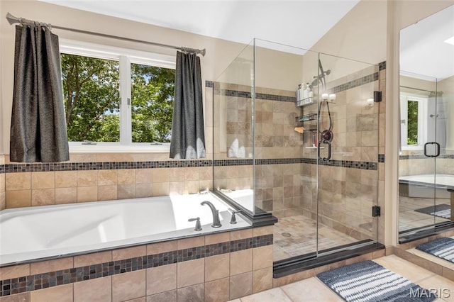 16517 Lancaster Estates Dr, Grover, MO 63040 - full bath with a bath, a shower stall, and tile patterned flooring