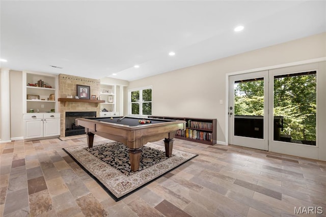 16517 Lancaster Estates Dr, Grover, MO 63040 - playroom featuring pool table, a fireplace, recessed lighting, and built in features