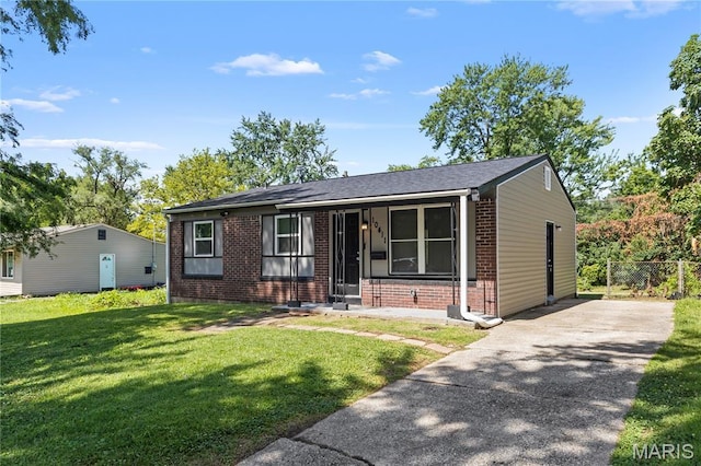 10411 Royal Dr, Saint Louis, MO 63136 - bungalow with brick siding and driveway