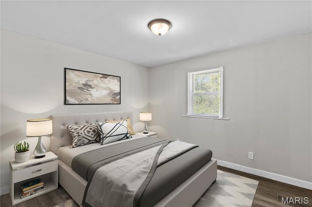 10411 Royal Dr, Saint Louis, MO 63136 - bedroom with wood finished floors and baseboards