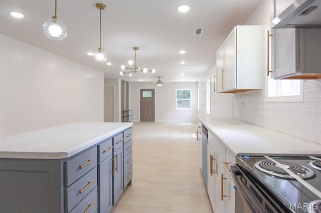 320 E Davidson Ave, Chaffee, MO 63740 - kitchen with wall chimney exhaust hood, light countertops, decorative backsplash, electric range oven, and recessed lighting