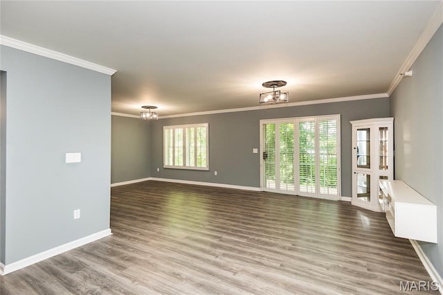 3624 Colonia Pl Unit B, Saint Louis, MO 63125 - unfurnished living room with ornamental molding, wood finished floors, plenty of natural light, and a chandelier