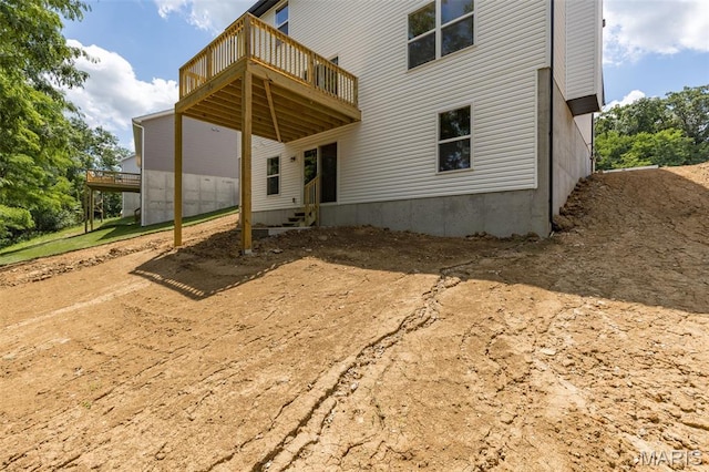 1917 Magnolia Way, Pevely, MO 63070 - rear view of house with a deck
