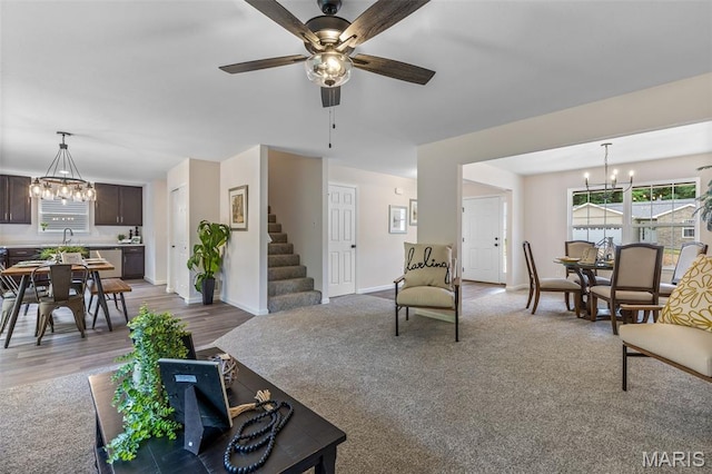 1917 Magnolia Way, Pevely, MO 63070 - living room with a chandelier, stairway, and plenty of natural light