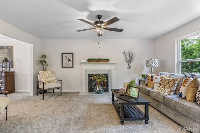 1917 Magnolia Way, Pevely, MO 63070 - carpeted living room with a tiled fireplace and ceiling fan