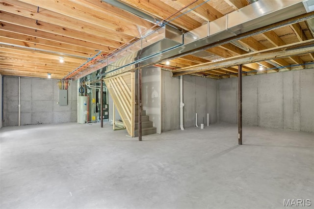 1917 Magnolia Way, Pevely, MO 63070 - unfinished basement featuring electric panel, water heater, and stairway