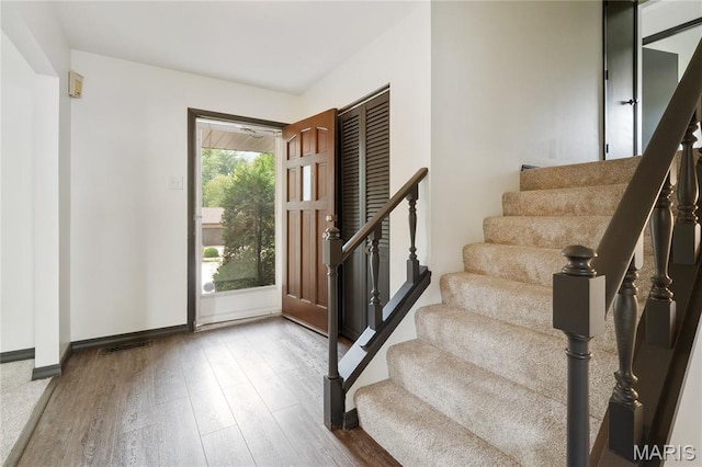 2516 Westminister Dr, Saint Charles, MO 63301 - foyer with wood finished floors and stairway
