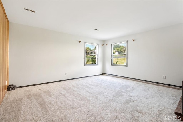 2516 Westminister Dr, Saint Charles, MO 63301 - empty room featuring light colored carpet and baseboards