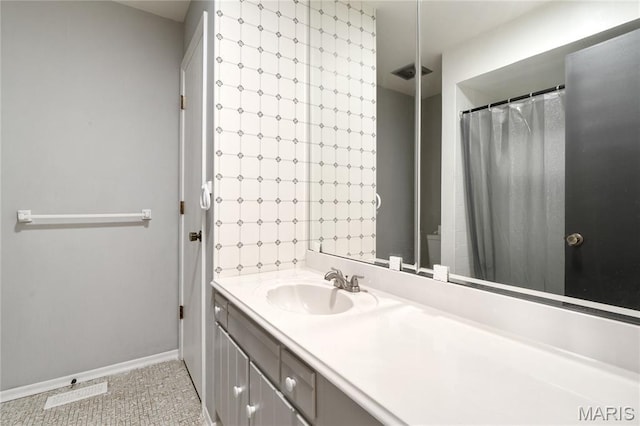 2516 Westminister Dr, Saint Charles, MO 63301 - full bath featuring vanity and baseboards