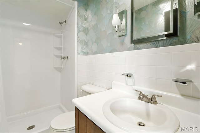 2516 Westminister Dr, Saint Charles, MO 63301 - bathroom with wallpapered walls, a stall shower, and vanity