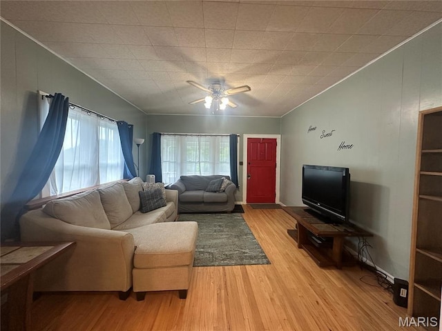 806 Pleasant St, Hannibal, MO 63401 - living room featuring light wood finished floors, ornamental molding, and ceiling fan