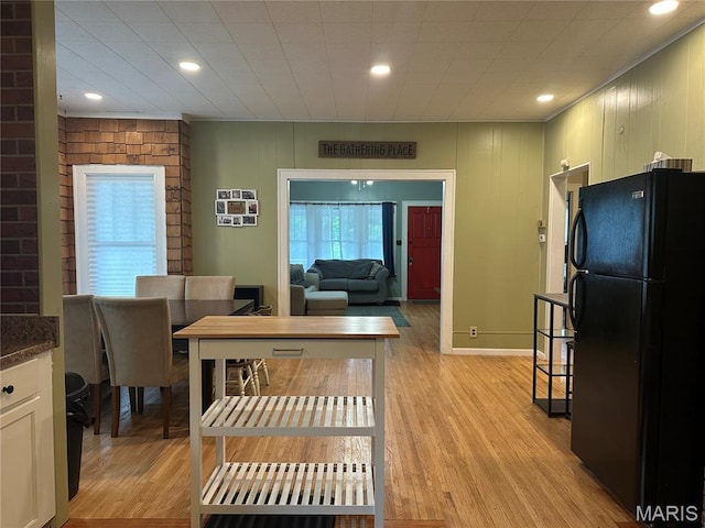 806 Pleasant St, Hannibal, MO 63401 - dining room featuring light wood-style floors and recessed lighting