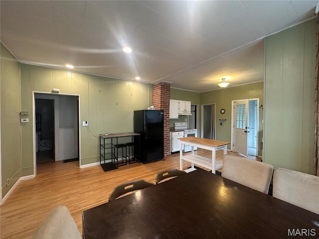 806 Pleasant St, Hannibal, MO 63401 - living room with light wood-type flooring and baseboards
