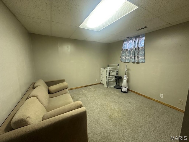 806 Pleasant St, Hannibal, MO 63401 - living area featuring a drop ceiling and carpet floors