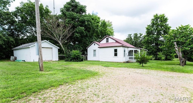 15902 County Road 7520, Newburg, MO 65550 - view of grassy yard with a garage, an outdoor structure, and view of scattered trees