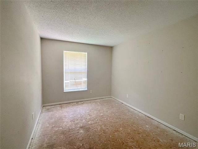 962 Martha Ave, Catawissa, MO 63015 - unfurnished room with a textured ceiling