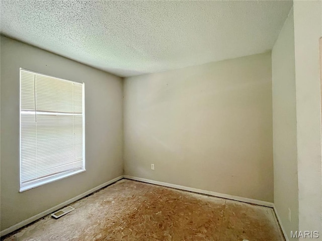 962 Martha Ave, Catawissa, MO 63015 - unfurnished room with a textured ceiling