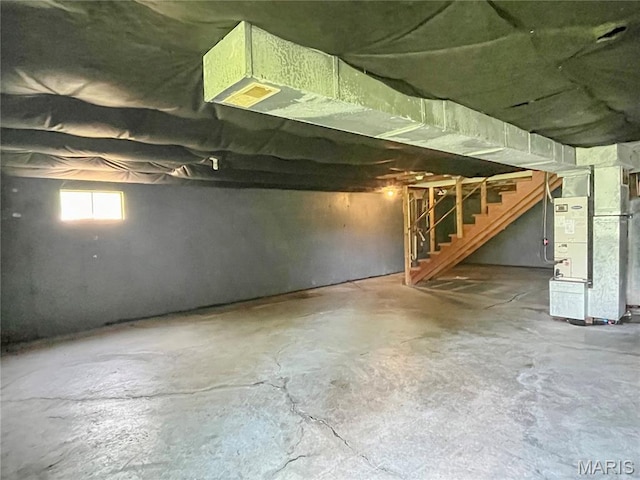 962 Martha Ave, Catawissa, MO 63015 - below grade area featuring heating unit and stairs