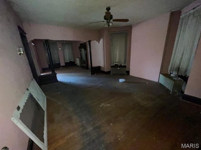 1063 Hornsby Ave, Saint Louis, MO 63147 - unfurnished living room with ceiling fan and wood finished floors