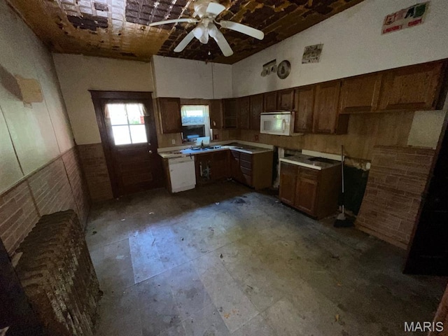 1063 Hornsby Ave, Saint Louis, MO 63147 - kitchen with white microwave and a ceiling fan