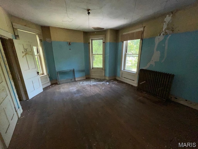 1063 Hornsby Ave, Saint Louis, MO 63147 - unfurnished room with wood finished floors and baseboards