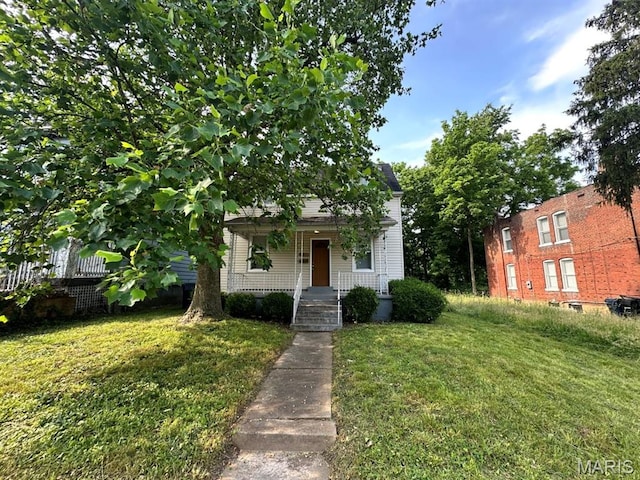 6624 Bartmer Ave, University City, MO 63130 - view of front of house featuring a front lawn