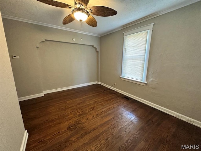 6624 Bartmer Ave, University City, MO 63130 - spare room featuring wood finished floors, ceiling fan, and ornamental molding