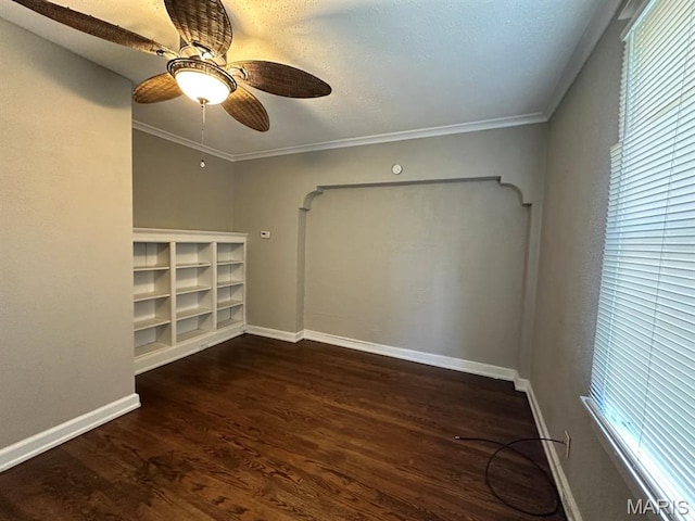 6624 Bartmer Ave, University City, MO 63130 - empty room featuring dark wood finished floors, ceiling fan, and ornamental molding