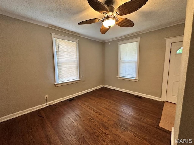 6624 Bartmer Ave, University City, MO 63130 - empty room featuring ornamental molding, dark wood-style flooring, a textured ceiling, and a ceiling fan