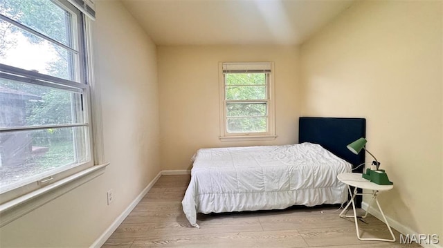 3400 Adie Rd, Saint Ann, MO 63074 - bedroom with wood finished floors