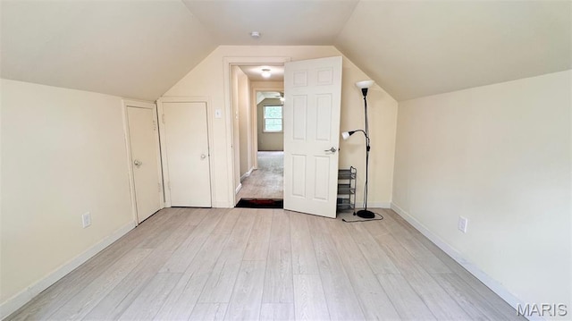 3400 Adie Rd, Saint Ann, MO 63074 - bonus room featuring light wood-type flooring and vaulted ceiling