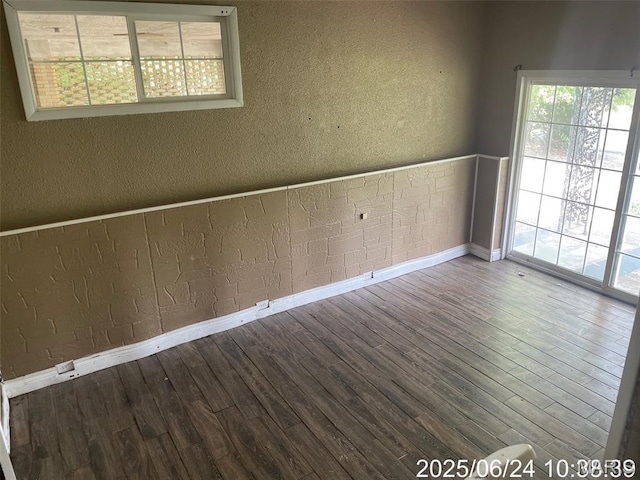 514 O Dell Ave, Richland, MO 65556 - empty room featuring a textured wall and wood finished floors