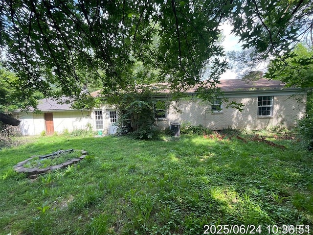 514 O Dell Ave, Richland, MO 65556 - back of property featuring a yard and brick siding
