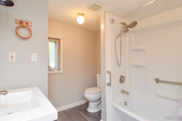 601 Mcbride Ave, Dupo, IL 62239 - full bathroom featuring wood finished floors and shower / bathtub combination