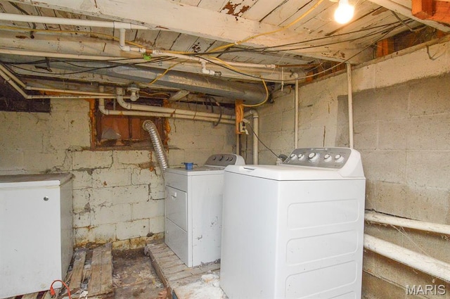 601 Mcbride Ave, Dupo, IL 62239 - unfinished basement featuring washer and dryer and fridge