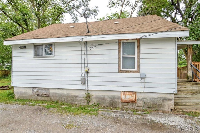 601 Mcbride Ave, Dupo, IL 62239 - view of home's exterior featuring a shingled roof and crawl space