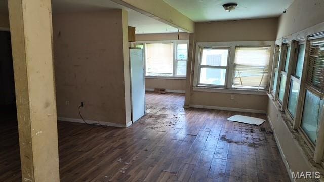 628 N Division St, Bonne Terre, MO 63628 - unfurnished room featuring hardwood / wood-style flooring and baseboards