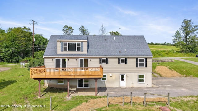 20337 State Route 171, Susquehanna, PA 18847 - back of house with a yard, a deck, and a shingled roof