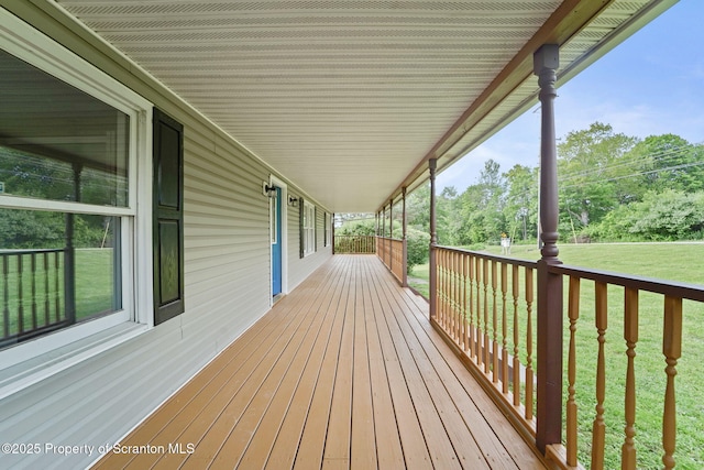 20337 State Route 171, Susquehanna, PA 18847 - wooden porch with a lawn