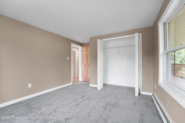 20337 State Route 171, Susquehanna, PA 18847 - unfurnished bedroom featuring baseboard heating, carpet floors, and a closet
