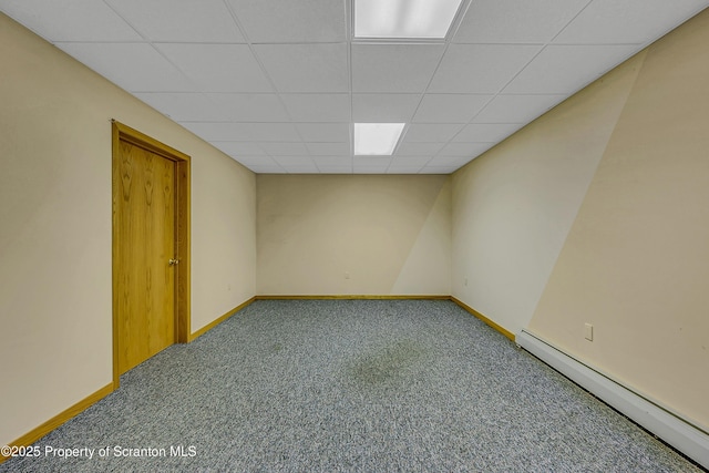 1742 State Route 848, New Milford, PA 18834 - empty room with a baseboard radiator, a drop ceiling, and carpet