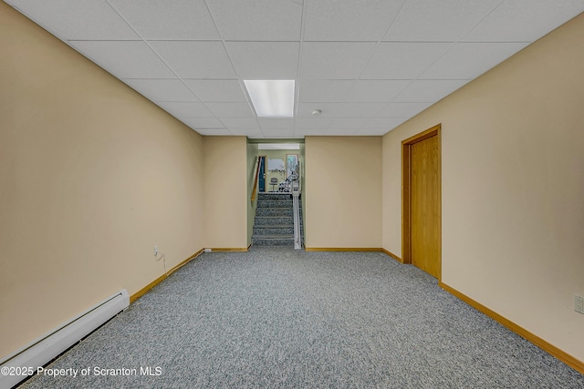 1742 State Route 848, New Milford, PA 18834 - empty room with baseboard heating, a paneled ceiling, carpet, and stairs