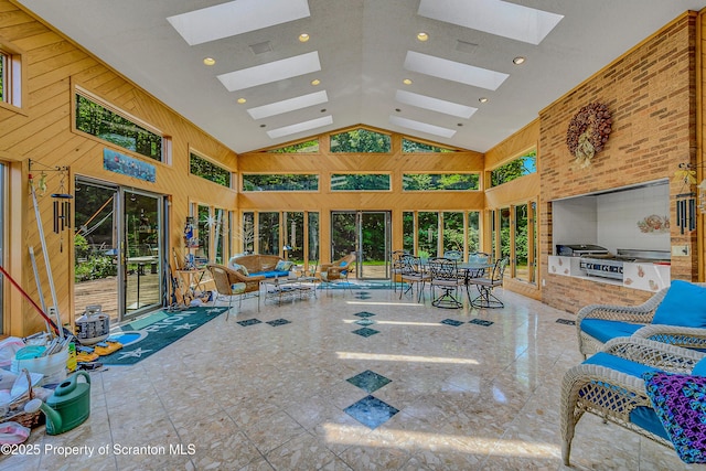 1742 State Route 848, New Milford, PA 18834 - sunroom featuring a skylight, wood walls, and high vaulted ceiling